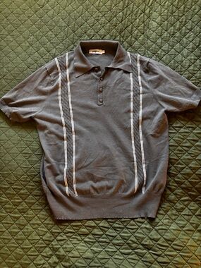 Vintage-Inspired Black Polo Shirt with Vertical Stripe Detail